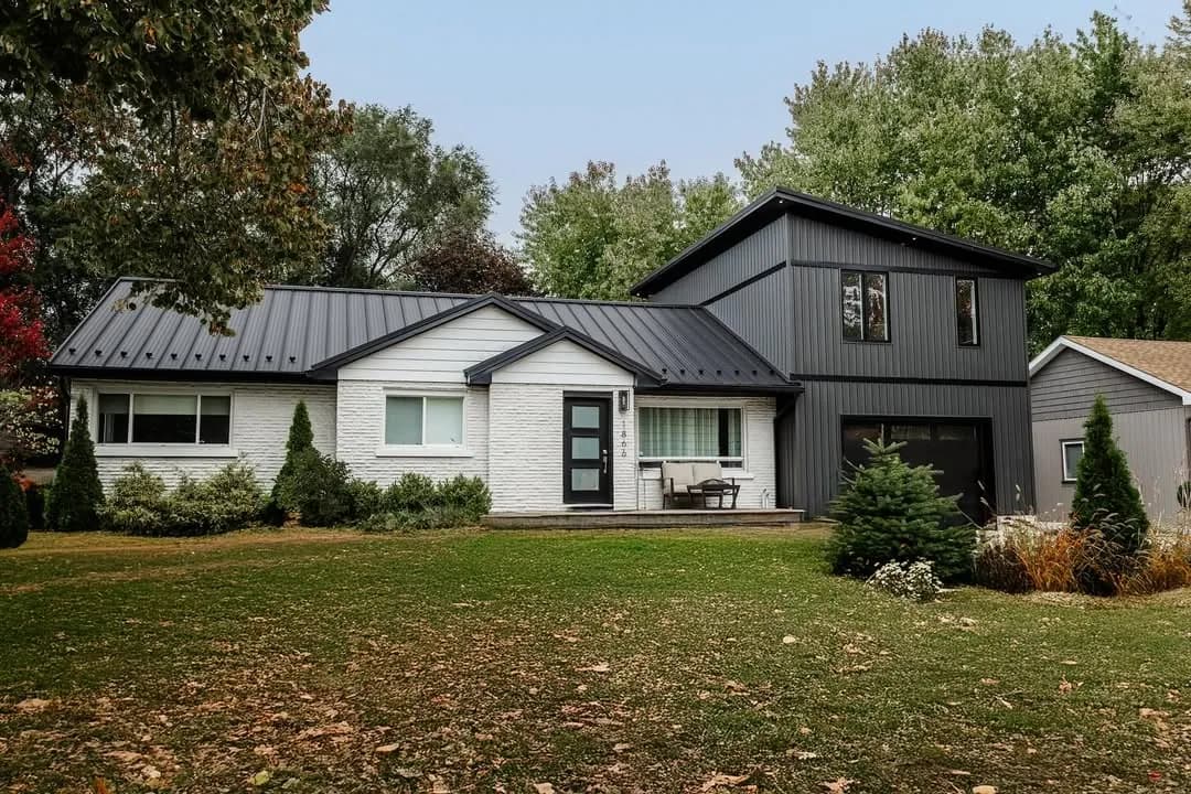 Complete attached Additional Dwelling Unit (ADU) construction including foundation work, utilities, interior finishes, and modern bathroom with wood-tone vanity.